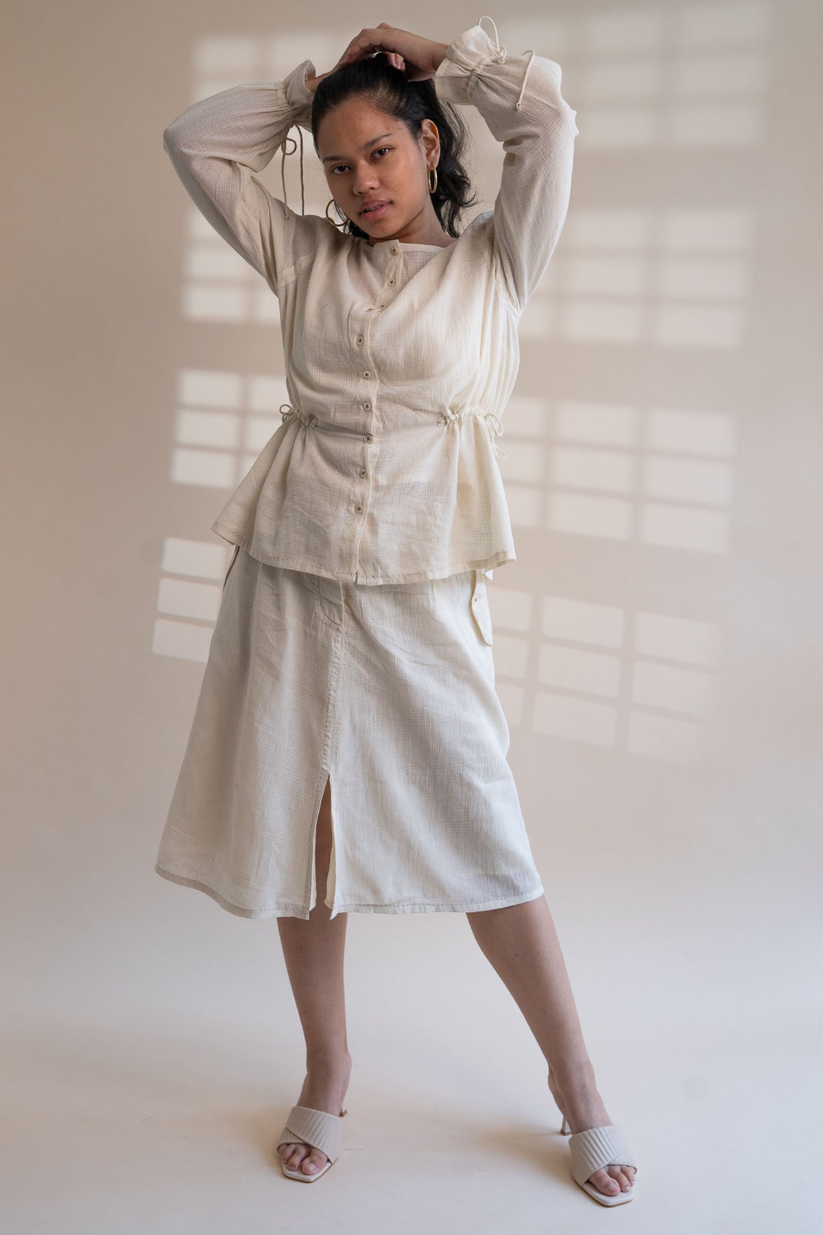 Buy Designer Buttoned Down Peplum Top By Lafaani