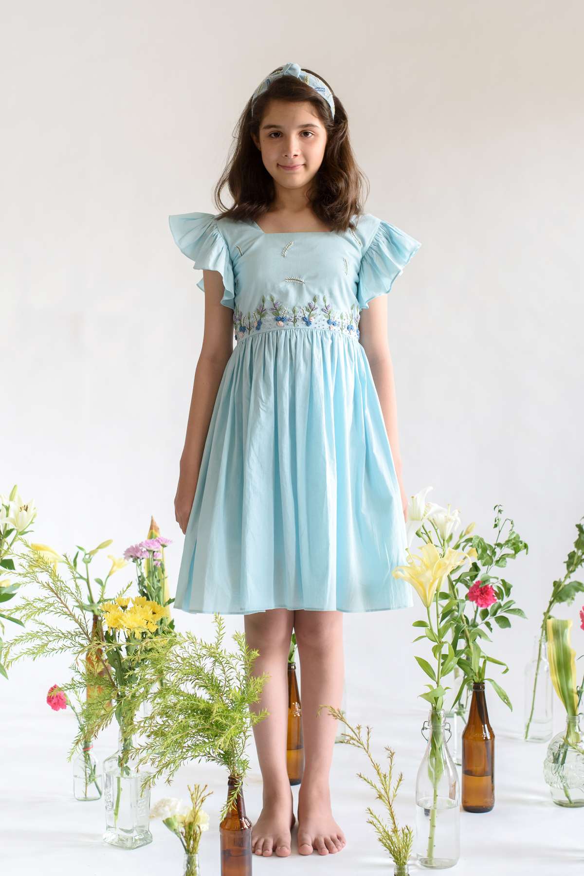 Buy Kids Designer Littleens Dress embroidered with prairie florals and fluted sleeve with a low back detail Online at ScrollnShops