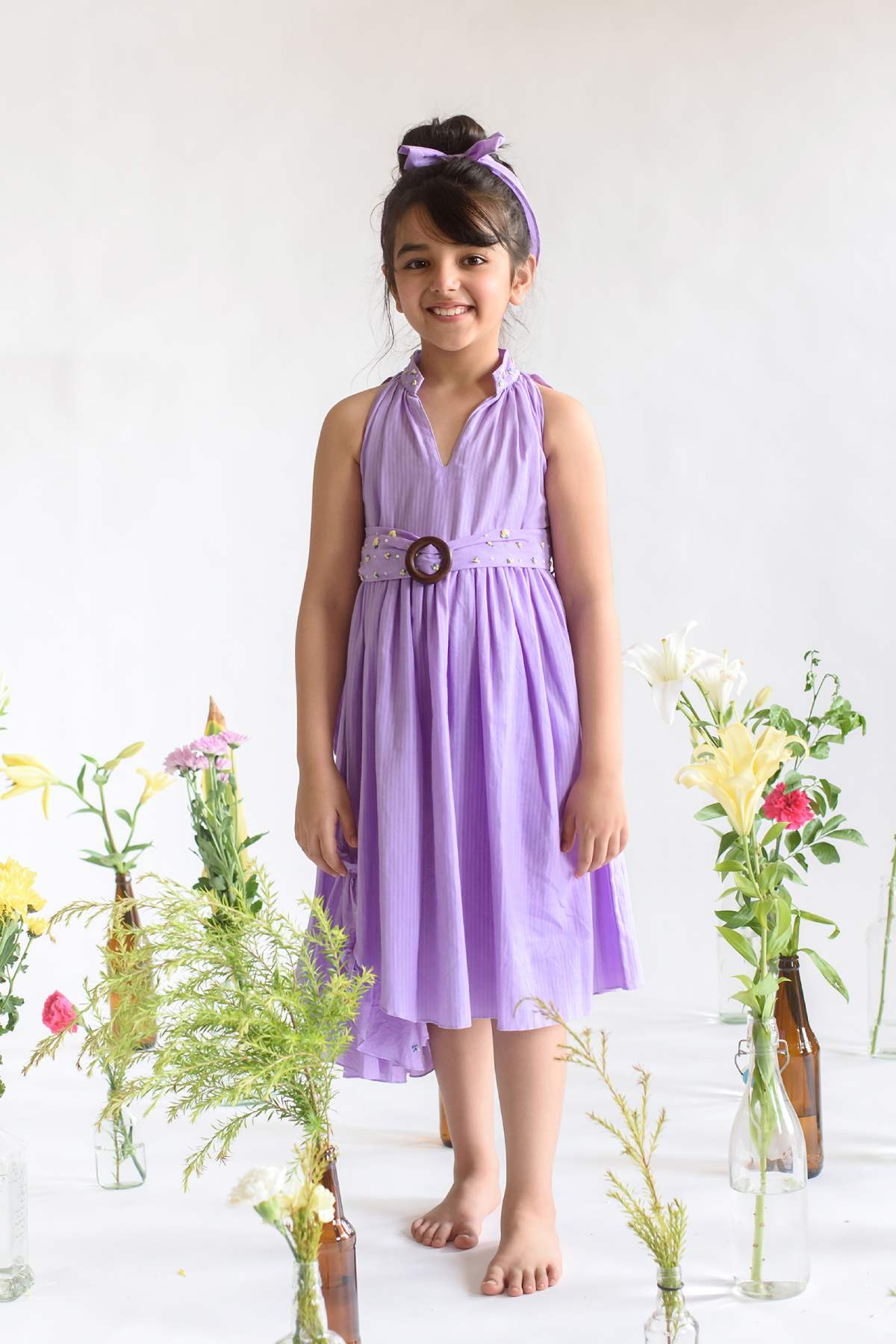 Buy Kids Designer Littleens Dress with gathered and double layered angel sleeves, square neckline which flows into a floral embroidery on the yoke, trailing layer on the empire and scalloped cutwork hems Online at ScrollnShops