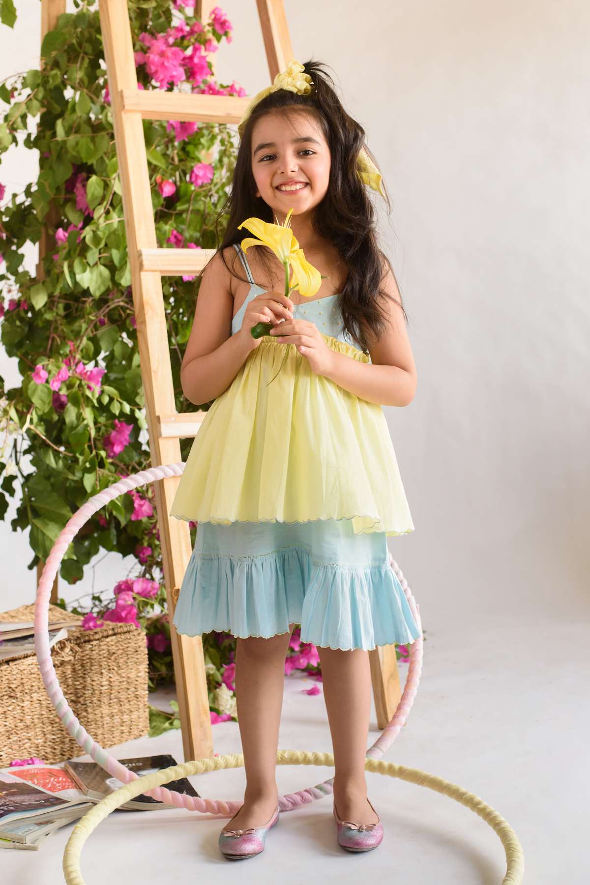 Buy Kids Designer Littleens Colour placement dress with delicate hand embroidery on the yoke, criss-cross tie-up detailing, contrast yellow delicate gathers above yoke and scalloped edges with fagoting on flared hem Online at ScrollnShops