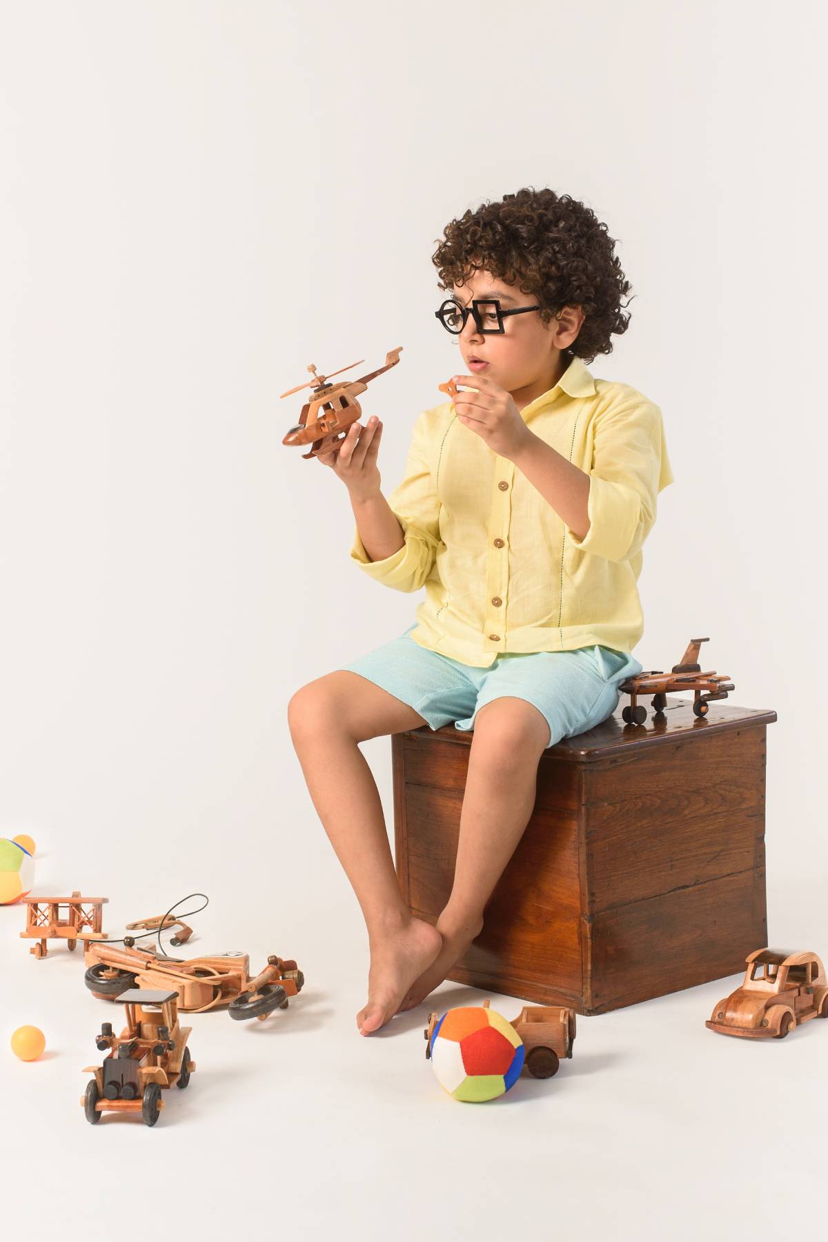 Buy Kids Designer Littleens Fagoting detailing at the panels of the shirt with bamboo buttons Online at ScrollnShops