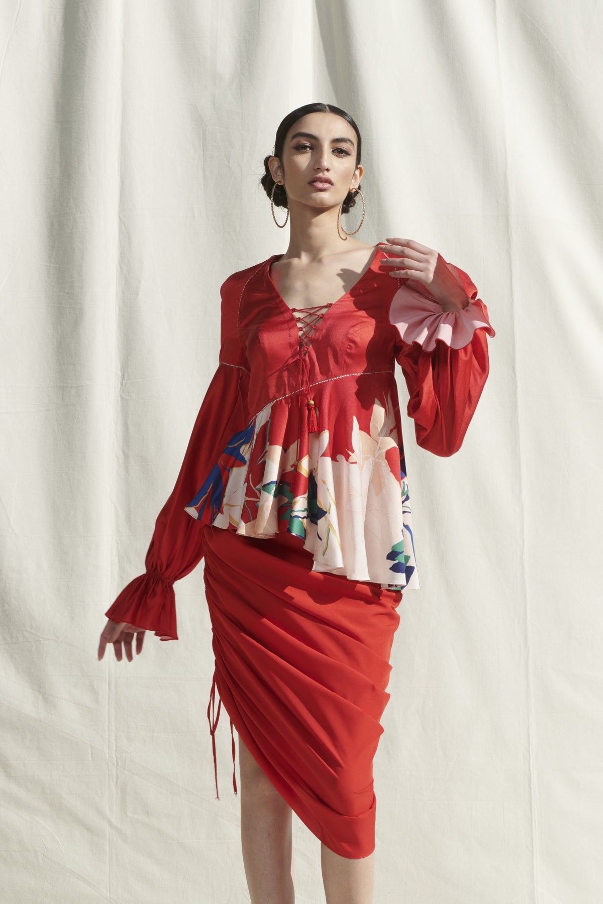 Buy Printed Peplum Top by Mandira Wirk