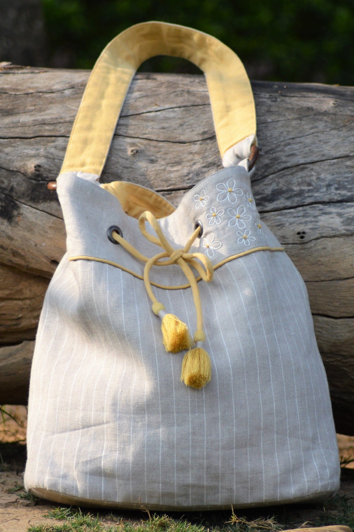 Buy Designer Striped Embroidered Bag Online